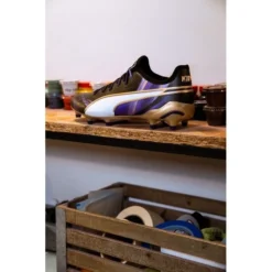 PUMA King Ultimate FG/AG Elements - Schwarz/PUMA Gold/Team Violet LIMITED EDITION -HEXA KLEIDUNG SHOP a663c62b6c2f